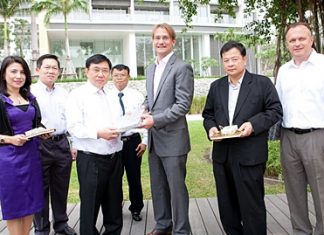 Hubert Viriot (3rd right), Raimon Land chief executive officer welcomes top officials from the Treasury Department, headed by Director General Vinai Vittavasgarnvej (3rd left) to Northpoint, the recently-completed residential development along prestigious Wongamat Beach. Also present during the visit were Deputy Director Generals Nipith Arieyawong (2nd left) and Wattana Chaowasakoo (4th left).